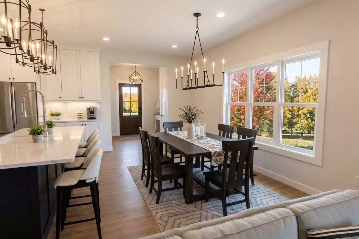 Dark Wood, Candlelight Fixtures, and Fall Color Right Outside the Glass