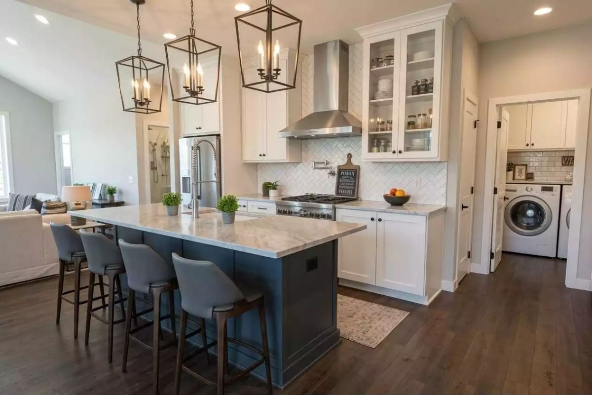 Lantern Pendants and a Navy Island That Earns Its Place at Center Stage