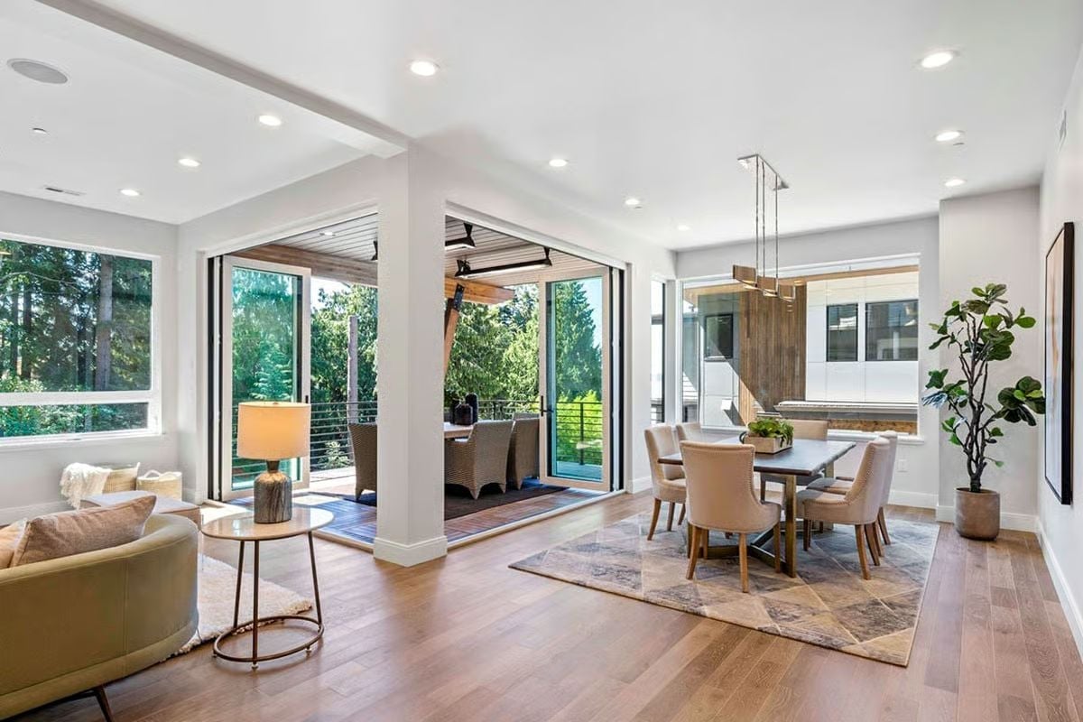 Folding Glass Walls Open the Dining Room Straight Onto the Deck