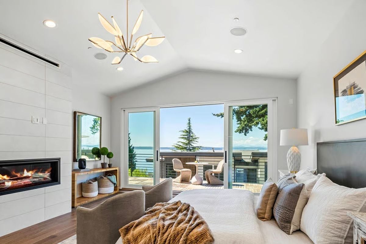 Vaulted Ceiling, Waterfront View, and a Fireplace You Can Watch From Bed