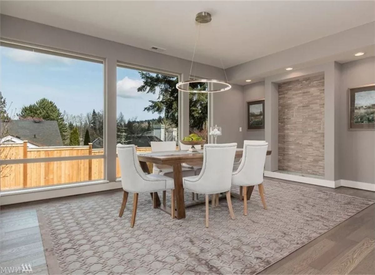 Circle Pendant, Stone Accent Wall, and Views That Do Half the Decorating