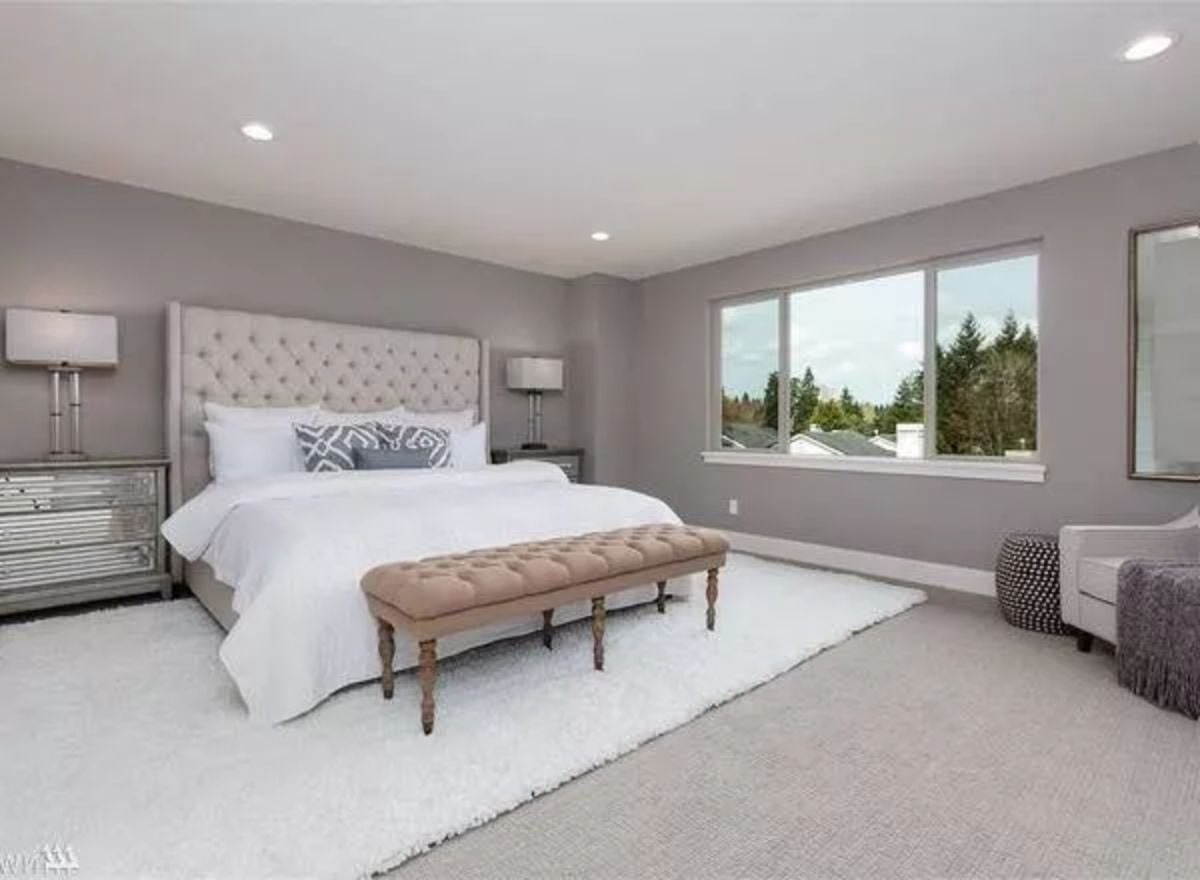 Tufted Headboard, Mirrored Dresser, and a Bench That Ties the Room Together