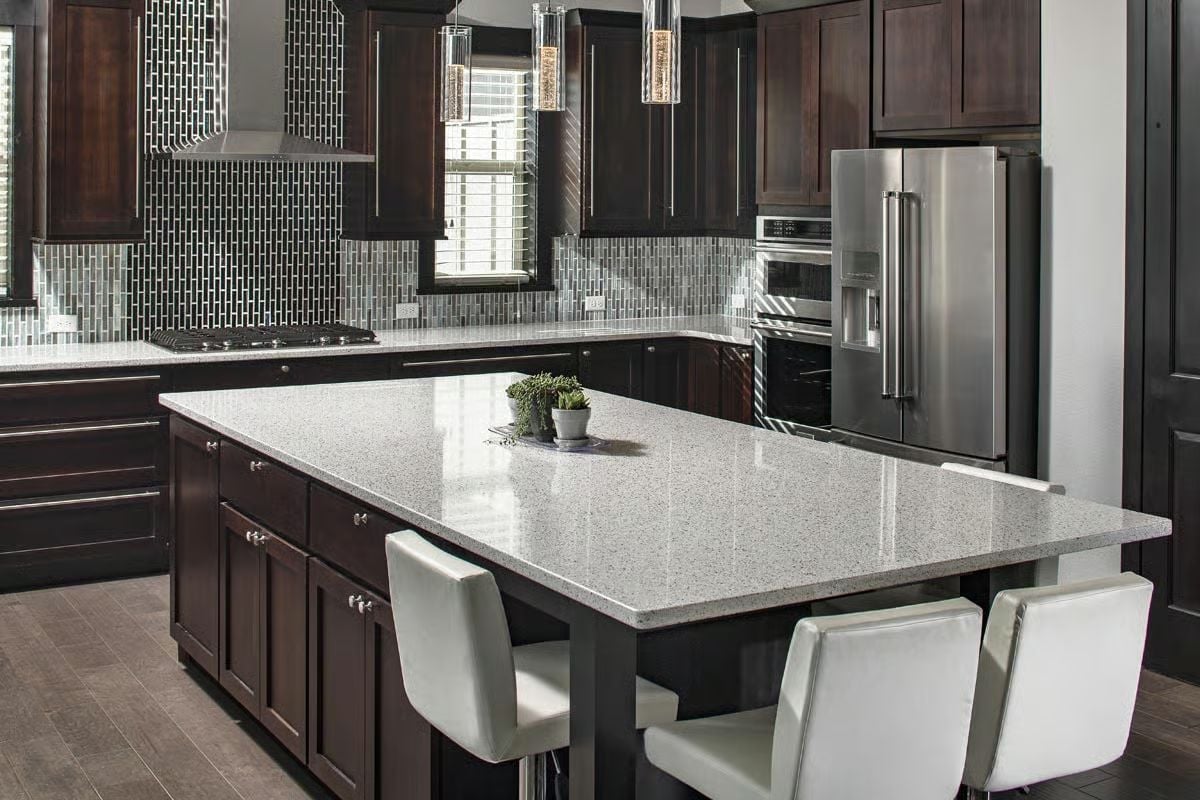 Espresso Cabinets and Granite Island Built for Kitchens That Mean Business