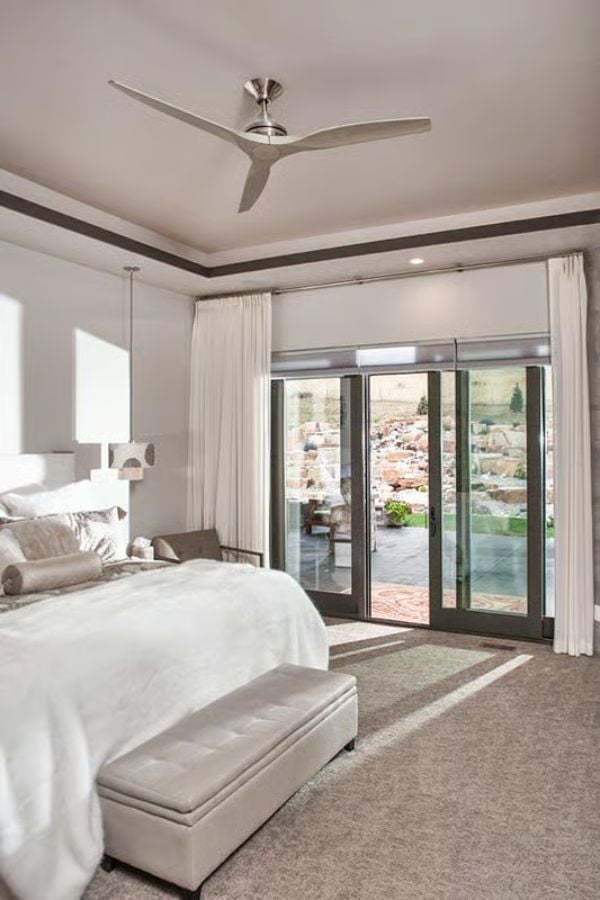Silver Ceiling Fan, Tufted Bench, and Doors That Open Straight to the Outside