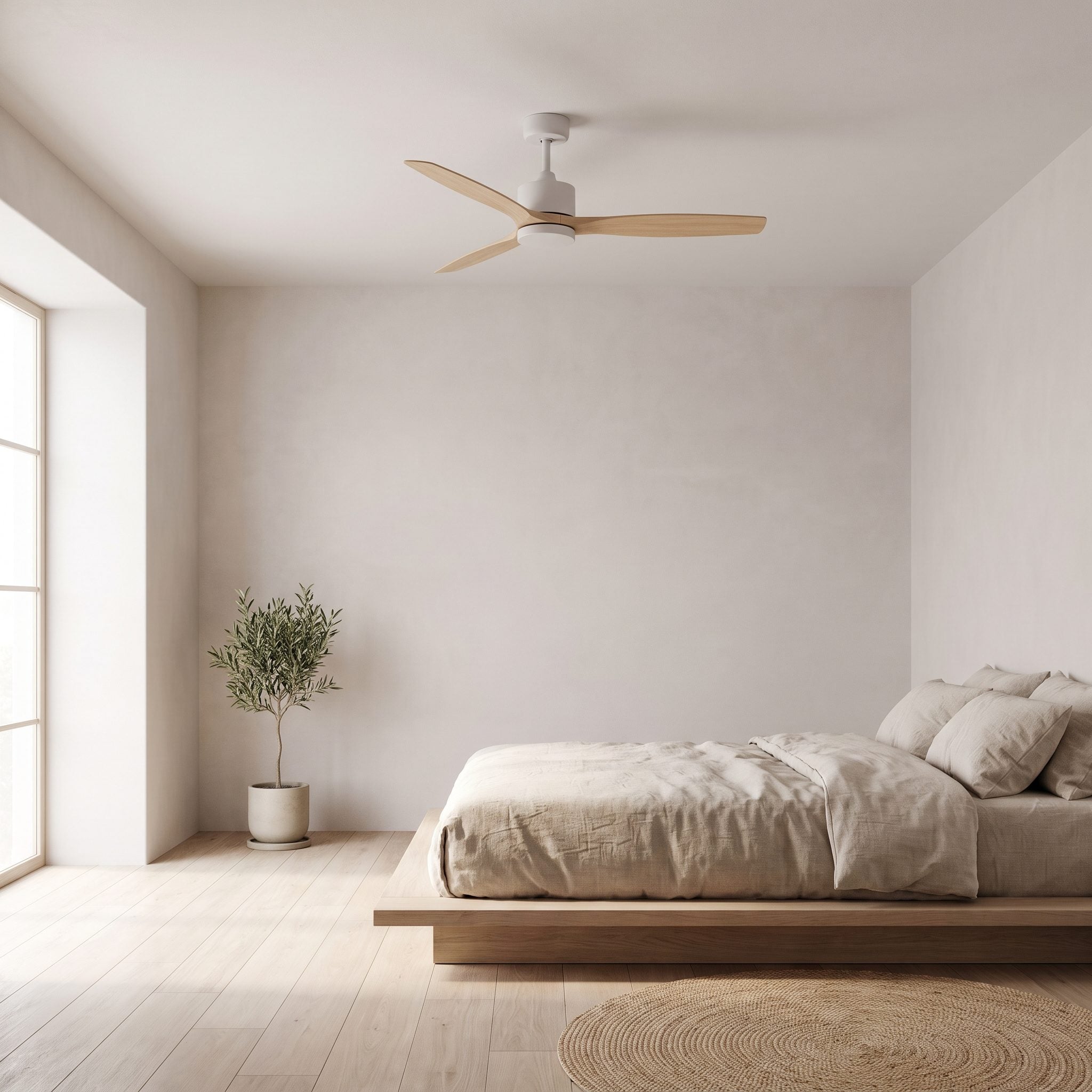 Small bedroom with a 42-inch flush-mount three-blade ceiling fan painted the same off-white as the eight-foot ceiling.