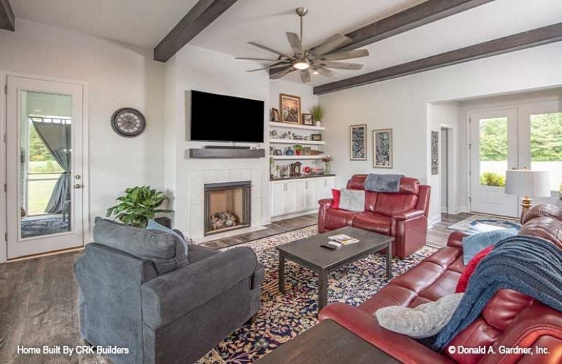 Exposed Beams, Red Leather, and a Fireplace That Actually Gets Used