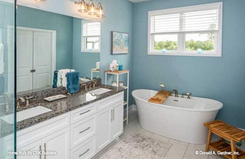 Freestanding Tub, Blue Walls, and Granite That Earns Its Keep