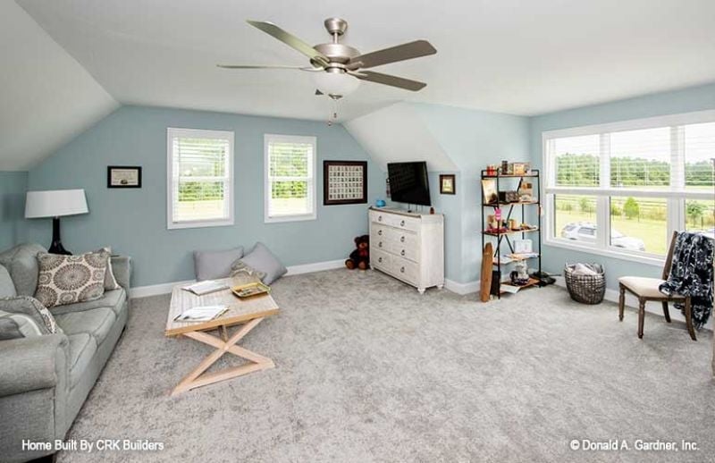 Vaulted Bonus Room with Carpet and Natural Light Built for Real Family Life
