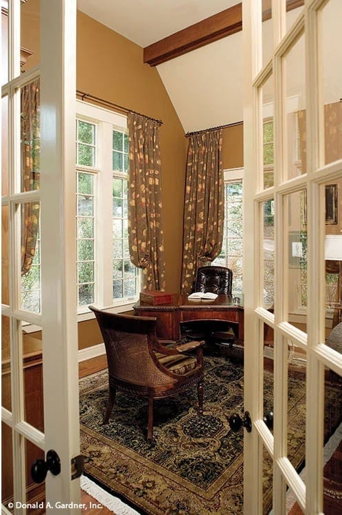 French Doors, Cane Chairs, and a Desk That Means Business