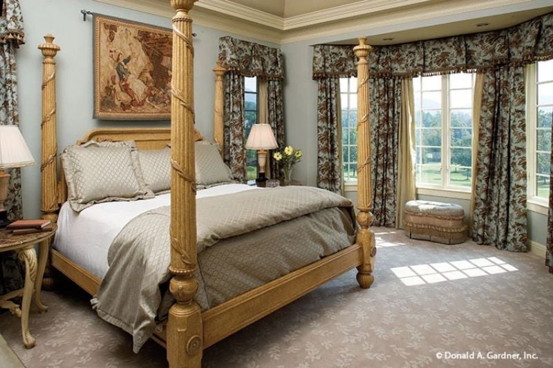Gold Posts, Floral Drapes, and a Four-Poster That Refuses to Apologize
