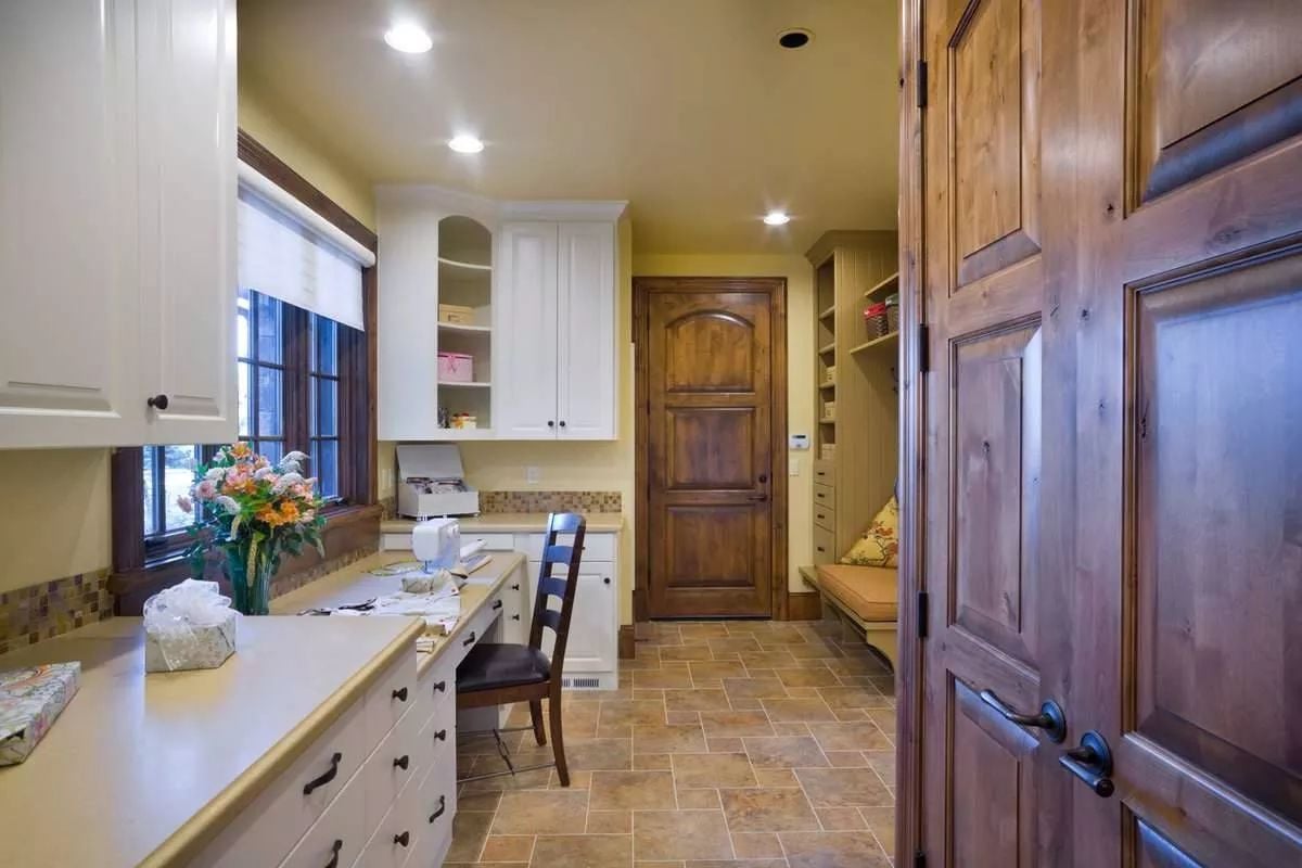 Knotty Alder Doors and White Built-Ins Share a Room Without Fighting for Attention