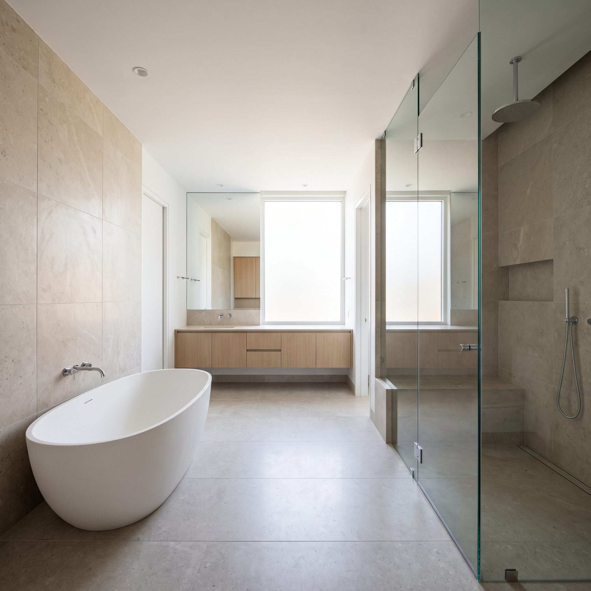 Split the Tub and Shower Across Opposite Walls in a Wider Room