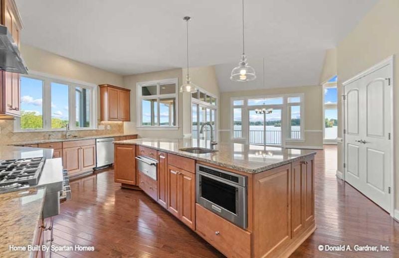 Kitchen Island With Its Own Oven Drawer and a View Straight to the Water