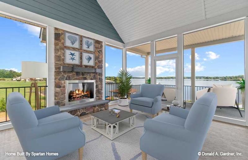 Screened Porch With a Stone Fireplace and a Lake That Won't Let You Look Away
