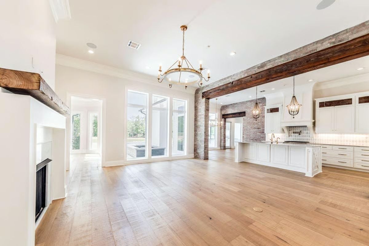 Reclaimed Beams and Brass Fixtures Pull This Open Plan in Two Directions at Once
