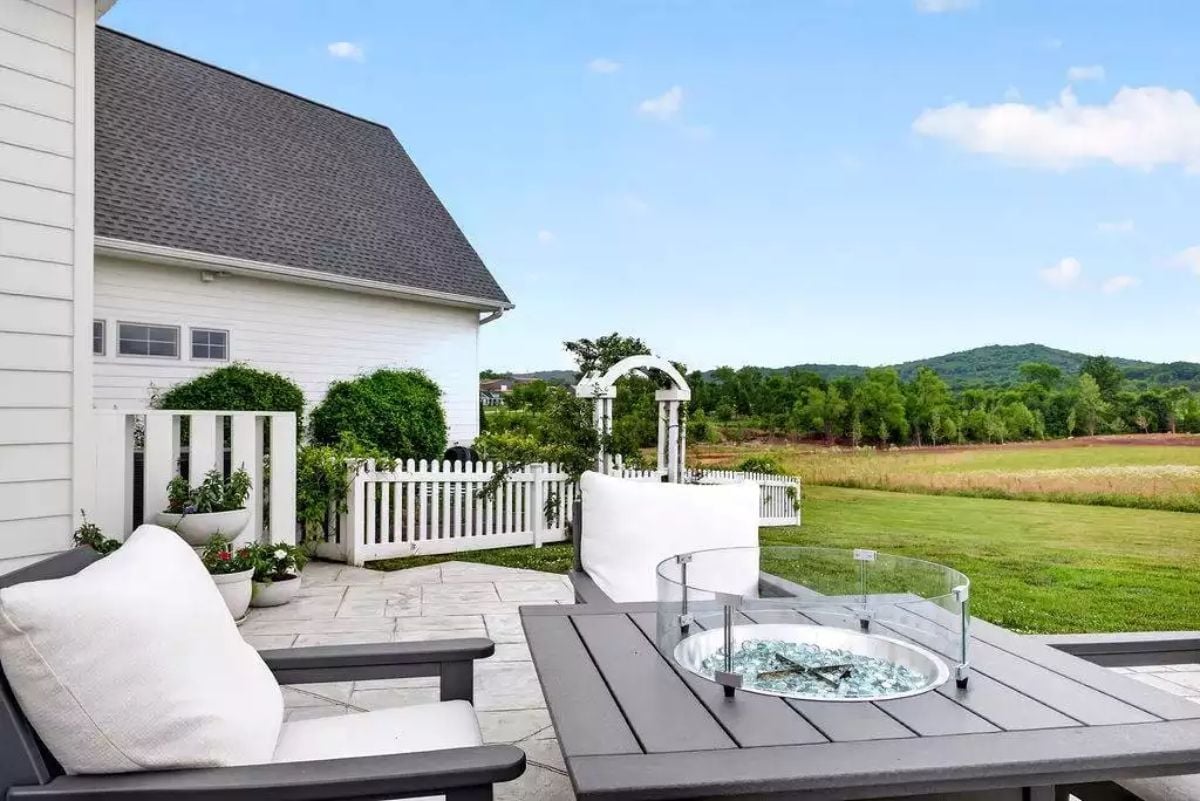 Gas Fire Pit Table and Open Acreage Turn the Back Patio Into a Destination
