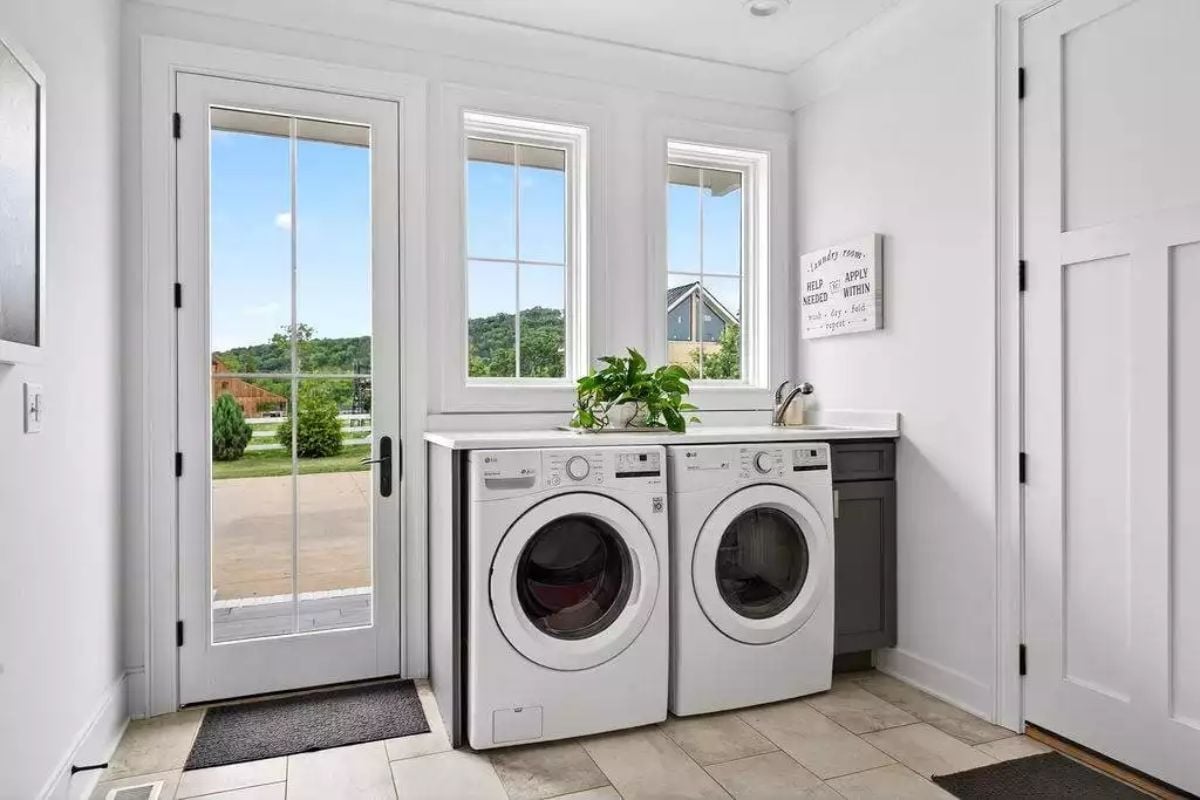 Laundry Room with a Glass Door and Enough Natural Light to Make Chores Feel Optional
