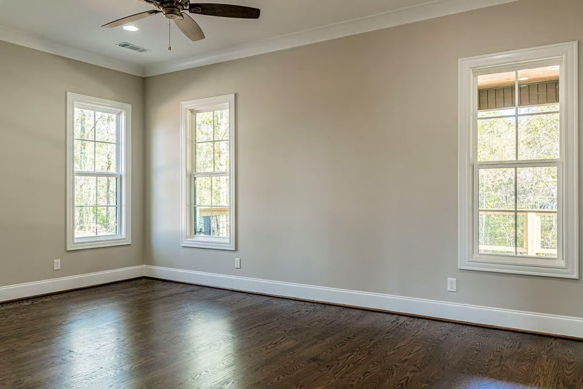 Crown Molding, Dark Floors, and Windows That Actually Earn Their Wall Space