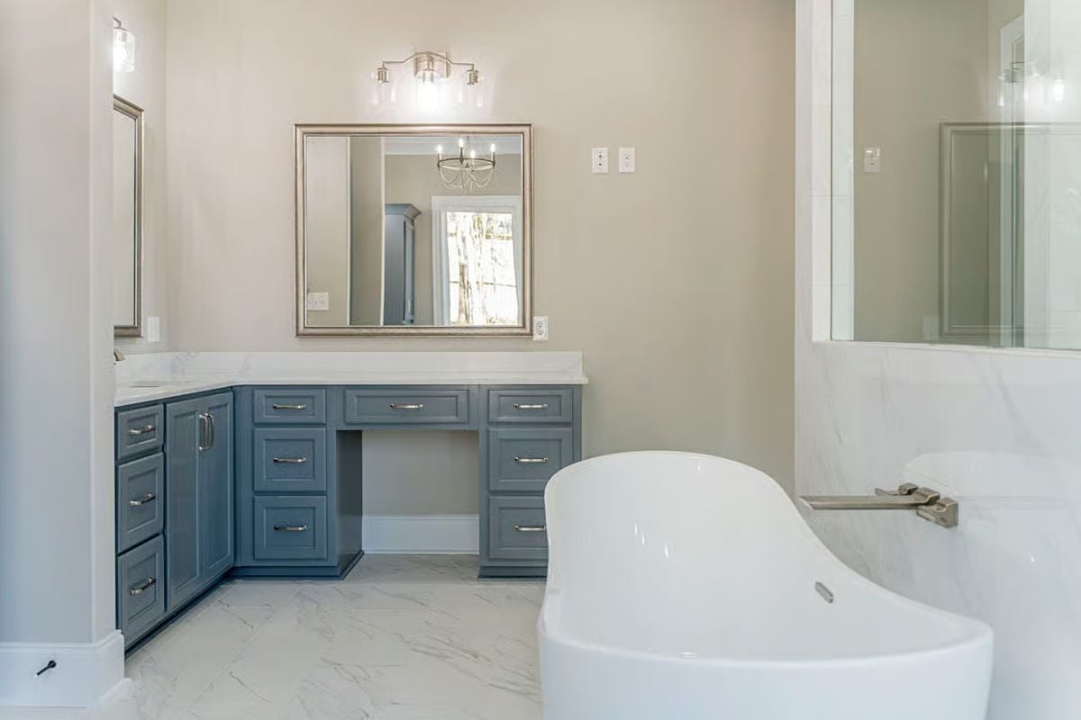 Slate-Blue Cabinetry and a Freestanding Tub That Doesn't Ask for Attention