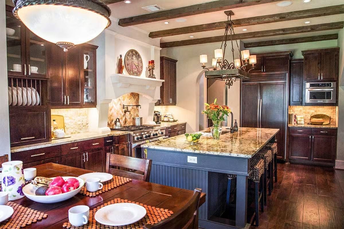 Granite, Dark Wood, and a Kitchen Island That Actually Has Room to Work