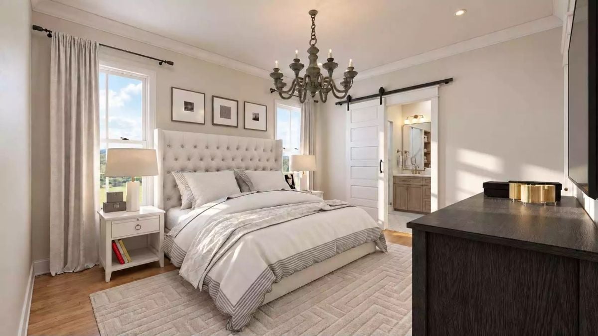 Barn Door, Chandelier, and a Tufted Headboard That Earns Every Inch of Wall Space