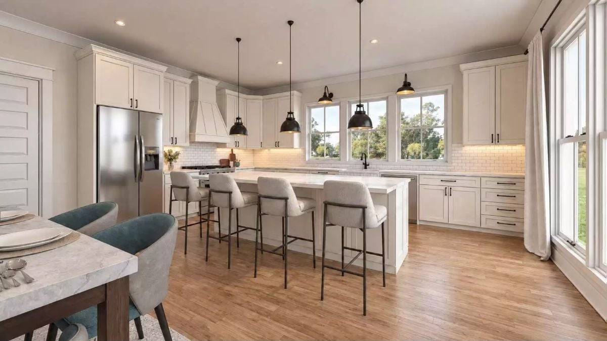 Pendant Lights Do the Heavy Lifting Over a White Quartz Island
