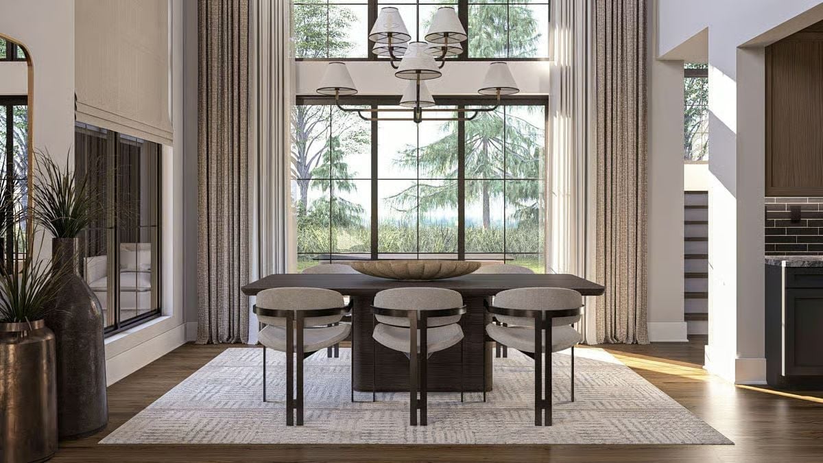 Barrel-Back Dining Chairs and a Dark Wood Table That Don't Ask for Attention