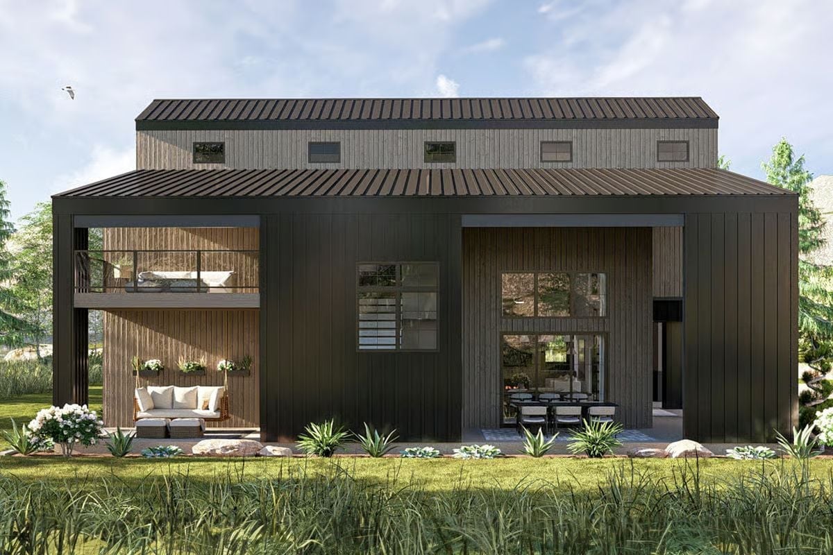 Dark Vertical Siding and a Metal Roof Give This Barn House Its Mountain Edge