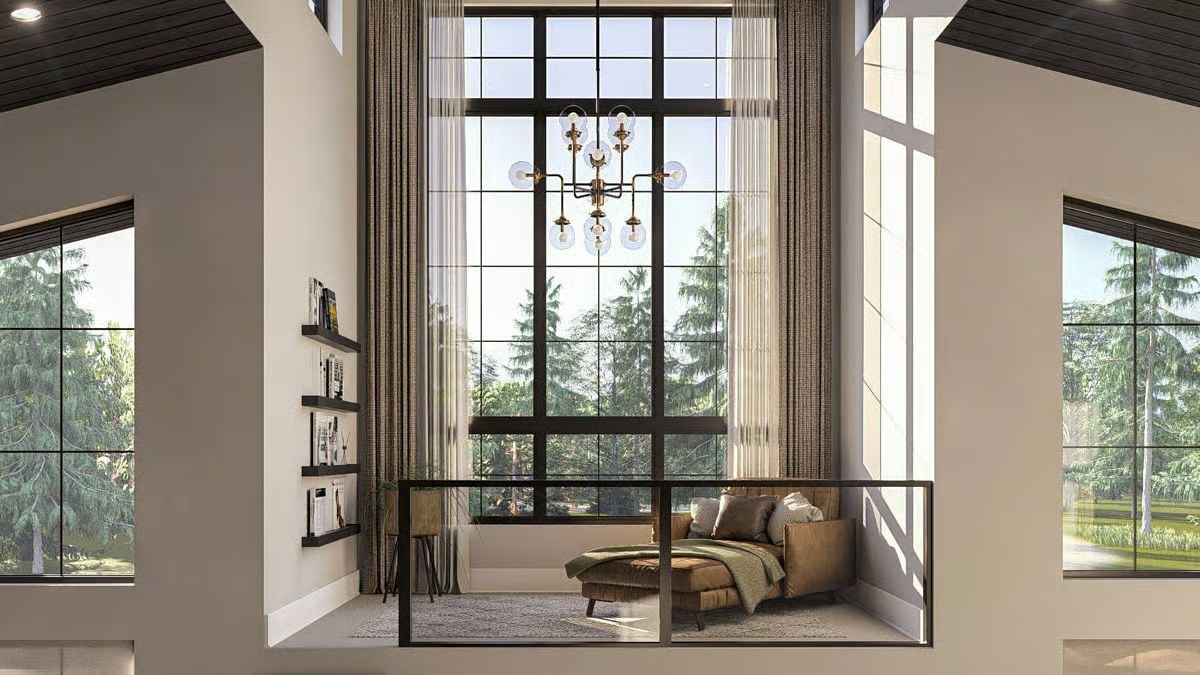Mezzanine Reading Nook With Glass Railings and a Two-Story Window Wall