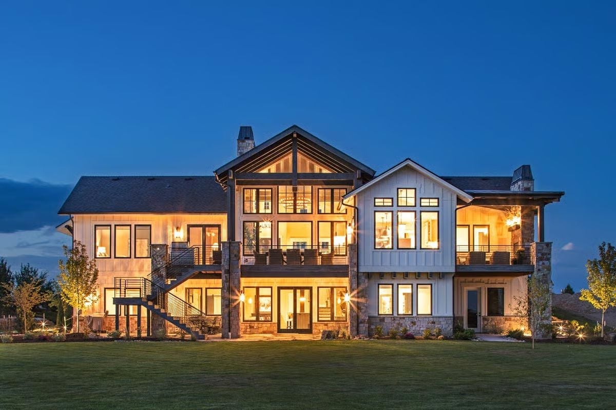 Warm Light Spilling from Every Window at the Hour When Houses Look Most Alive