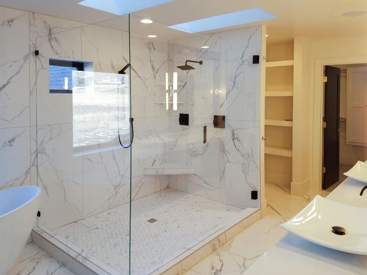 Matte Black Fixtures Against Full-Slab Marble Pull Off Something Rare