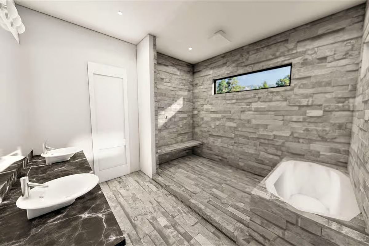 Gray Ledgestone, a Corner Soaking Tub, and Faucets That Float Off the Counter