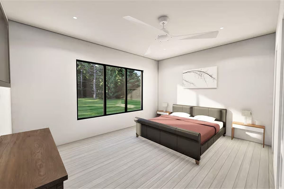 Leather Sleigh Bed, Blond Wood Floors, and a Window That Earns Its Keep