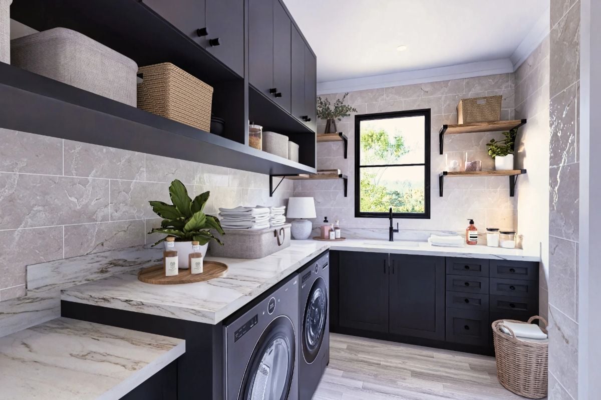 Marble Counters and Matte Black Cabinets Make Laundry Feel Less Like a Chore