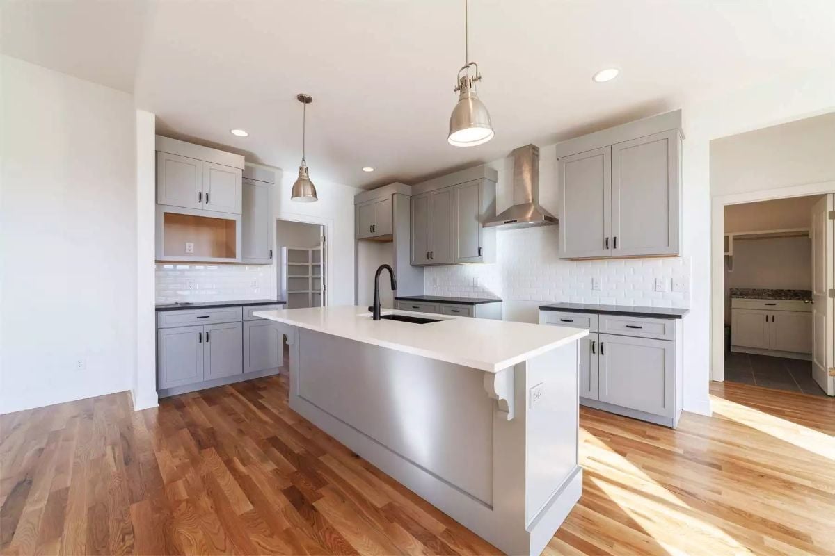 Gray Shaker Cabinets and a Waterfall Island Built for Serious Cooking