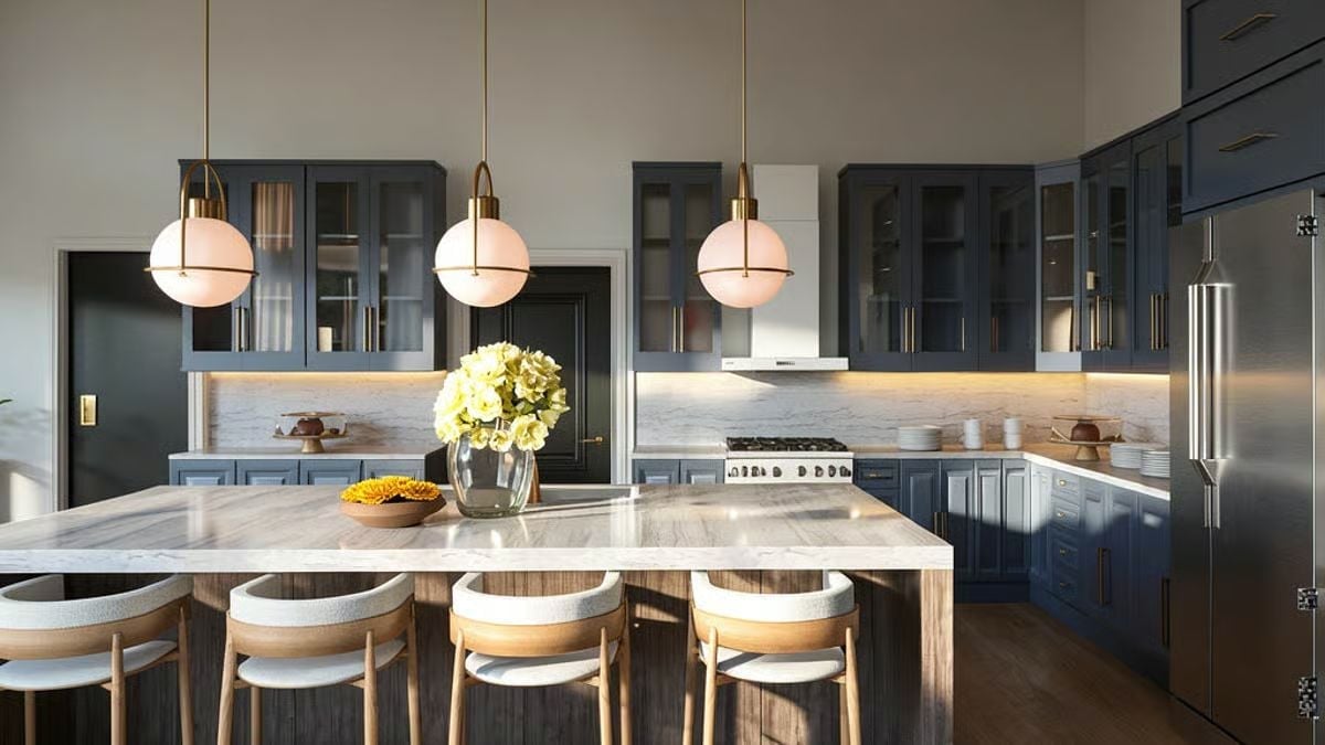 Navy Cabinets and Brass Pendants Pull Off the Classic Combination