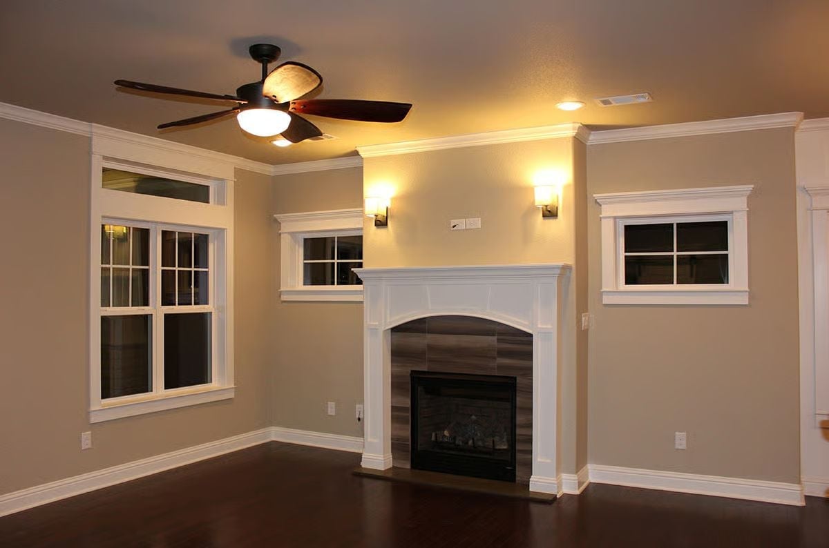 Sconce Lighting Flanking the Fireplace Does What Overhead Lights Can't