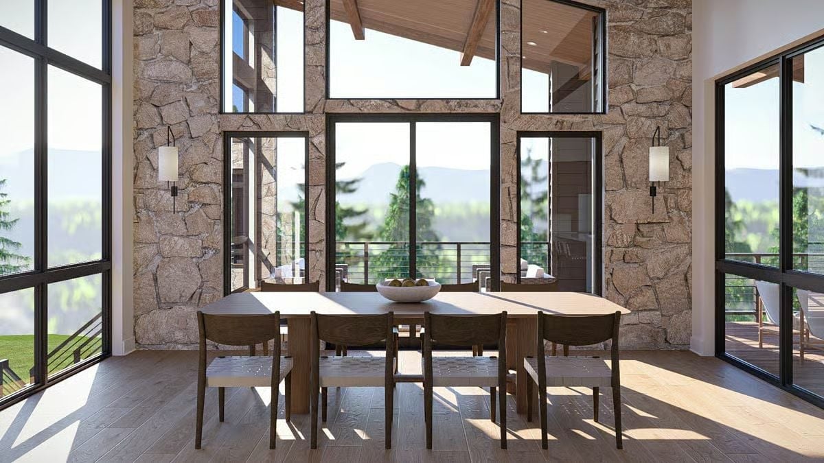 Clerestory Windows and Raw Stone Pull Natural Light Down Two Full Stories