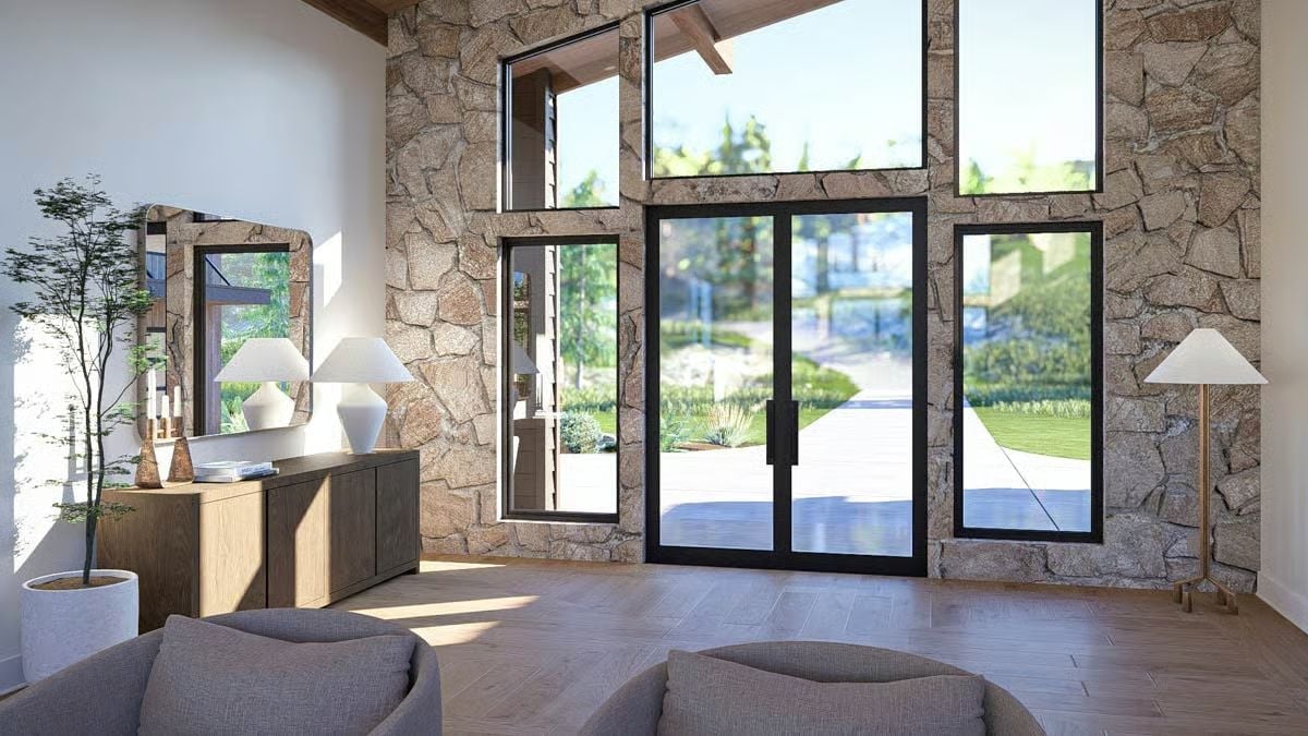 Raw Stone and Glass Make This Entryway Feel Like It Was Built Around the View