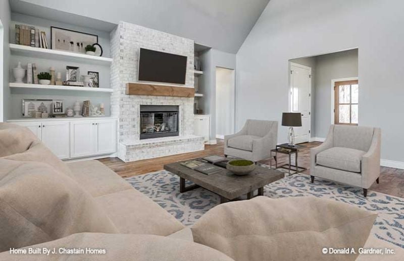 Brick Fireplace, Wood Mantel, and Built-Ins That Actually Have Room for Books