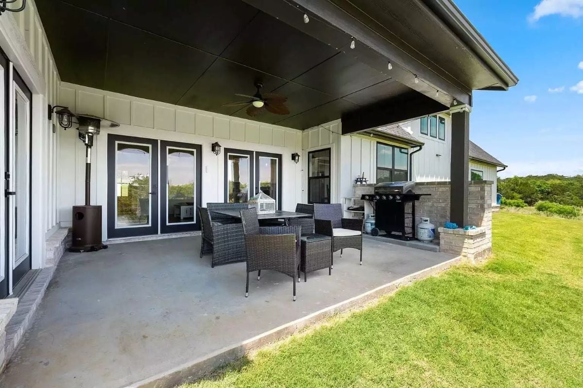 Covered Patio Built for Evening Grilling and Morning Coffee in Equal Measure