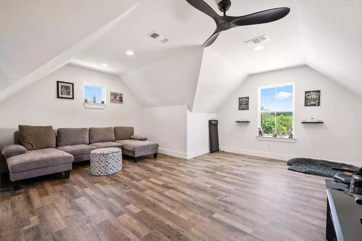 Vaulted Bonus Room with Jack Daniel's Decor and Room Left Over for Whatever's Next