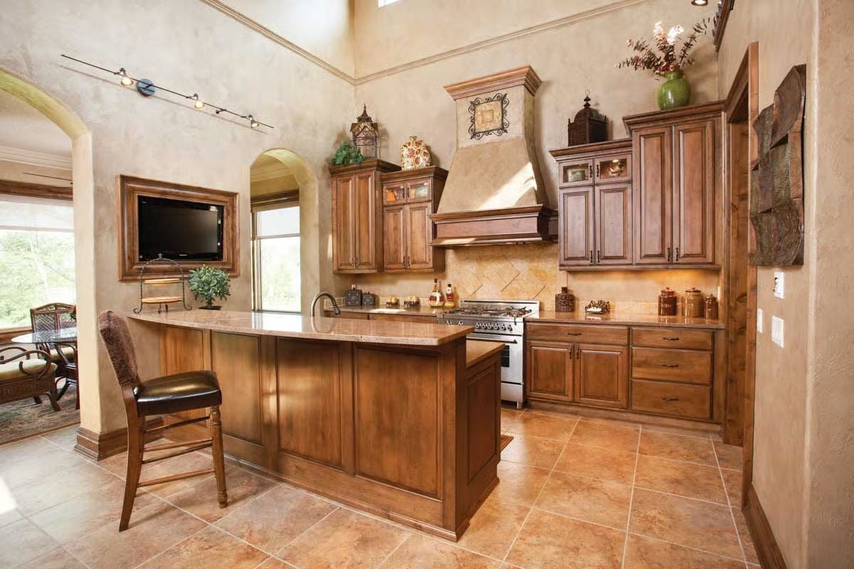 Curved Island, Range Hood Built Like Furniture, and Morning Light That Does the Work