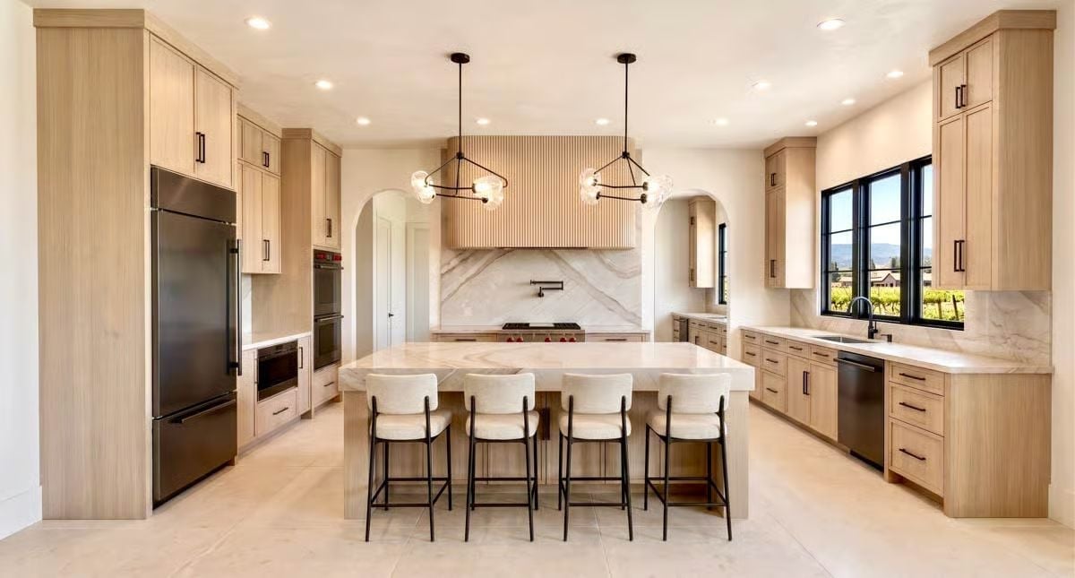 Fluted Hood, Marble Slab, and a Six-Seat Island That Actually Has Room to Work