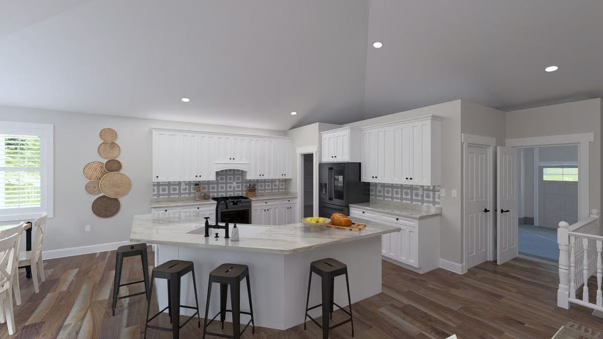 Black Farmhouse Faucet and Marble Island Make a Strong Case for Staying In