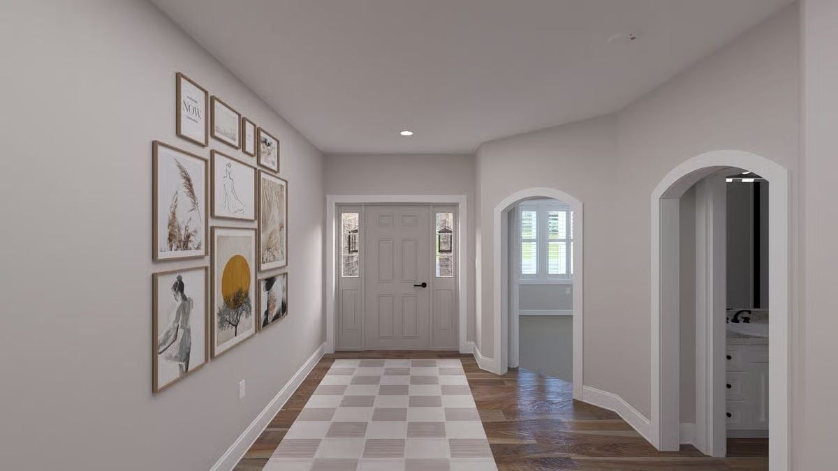 Checkered Foyer Rug and Gallery Wall Set the Tone Before You're Even Inside