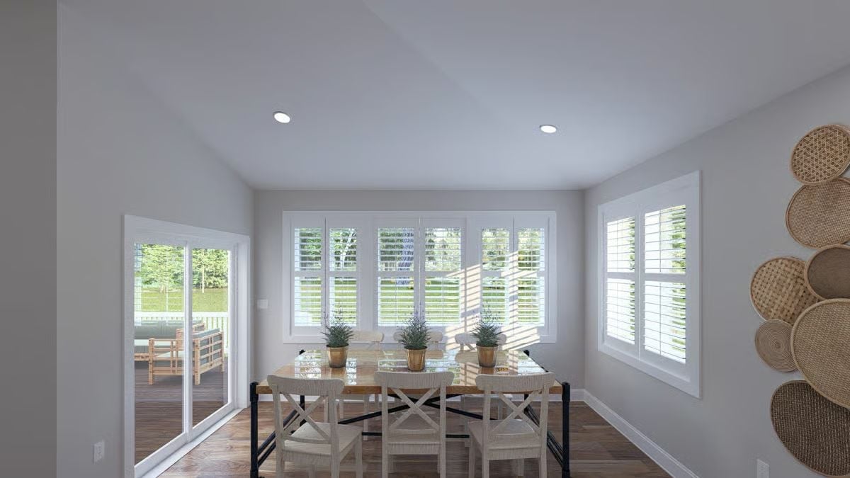 Rattan Wall Art and Shuttered Windows Give This Dining Room Its Personality