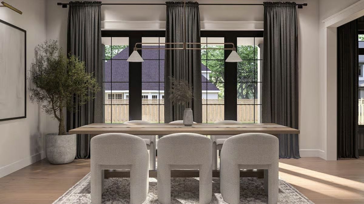 Boucle Chairs and Bronze Hardware Give This Dining Room Its Grip