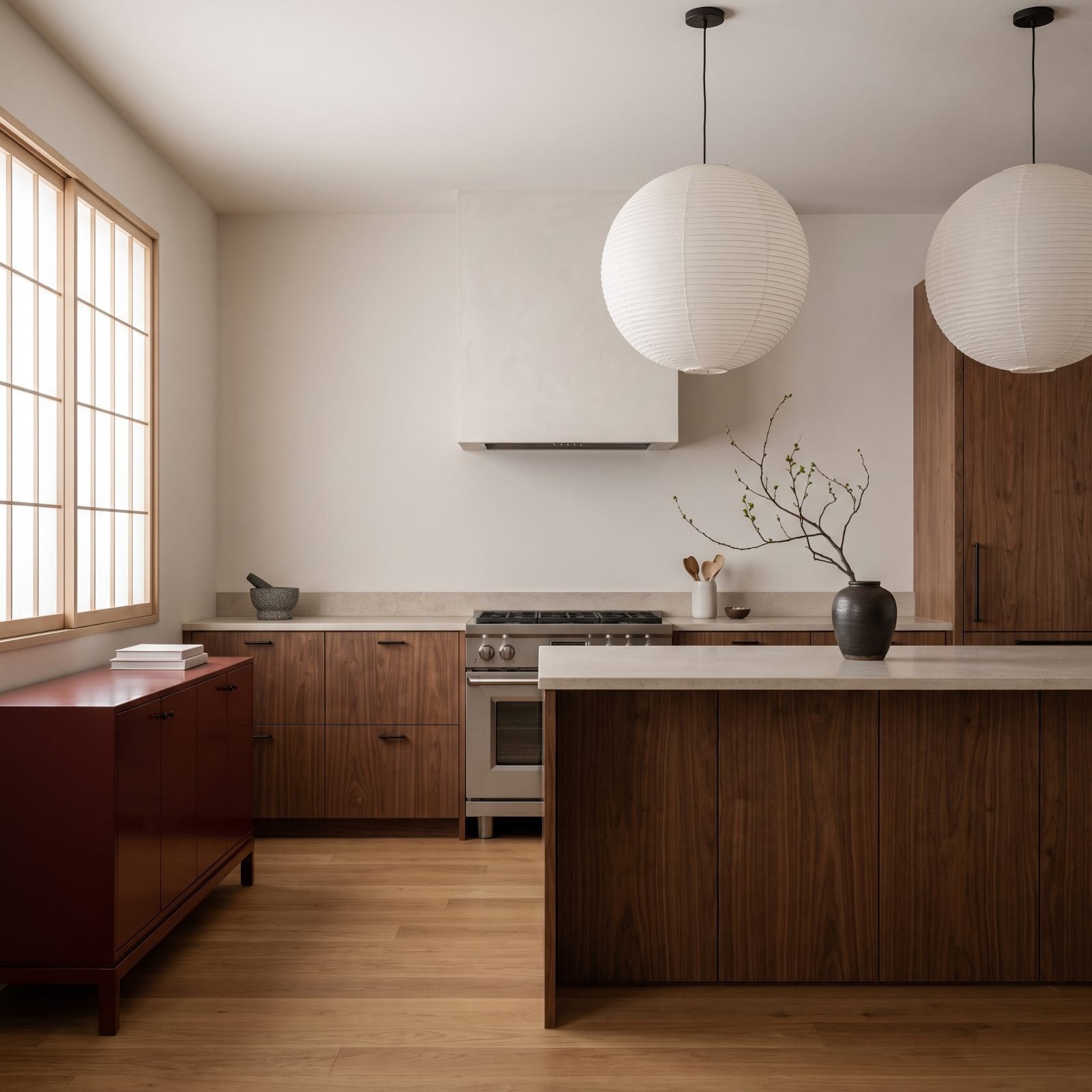 Walnut-and-Red Japandi Kitchen With Paper Lanterns