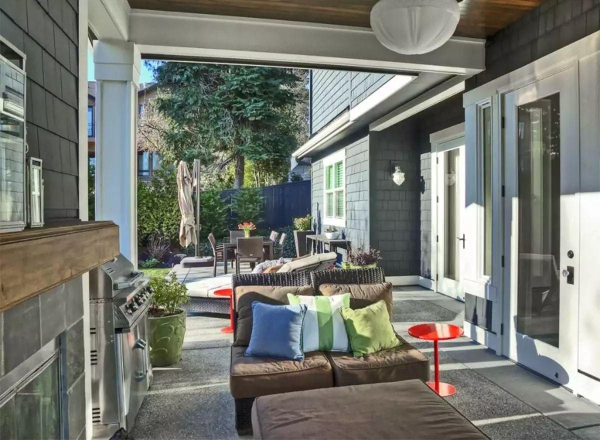 Covered Patio with an Outdoor Kitchen Pulls the Living Room Outside